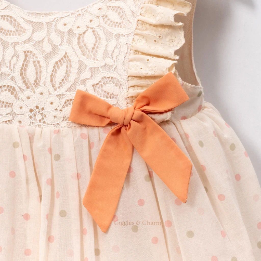 Mini dotted bow dress