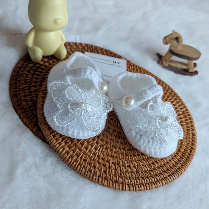 Knit butterfly baby booties