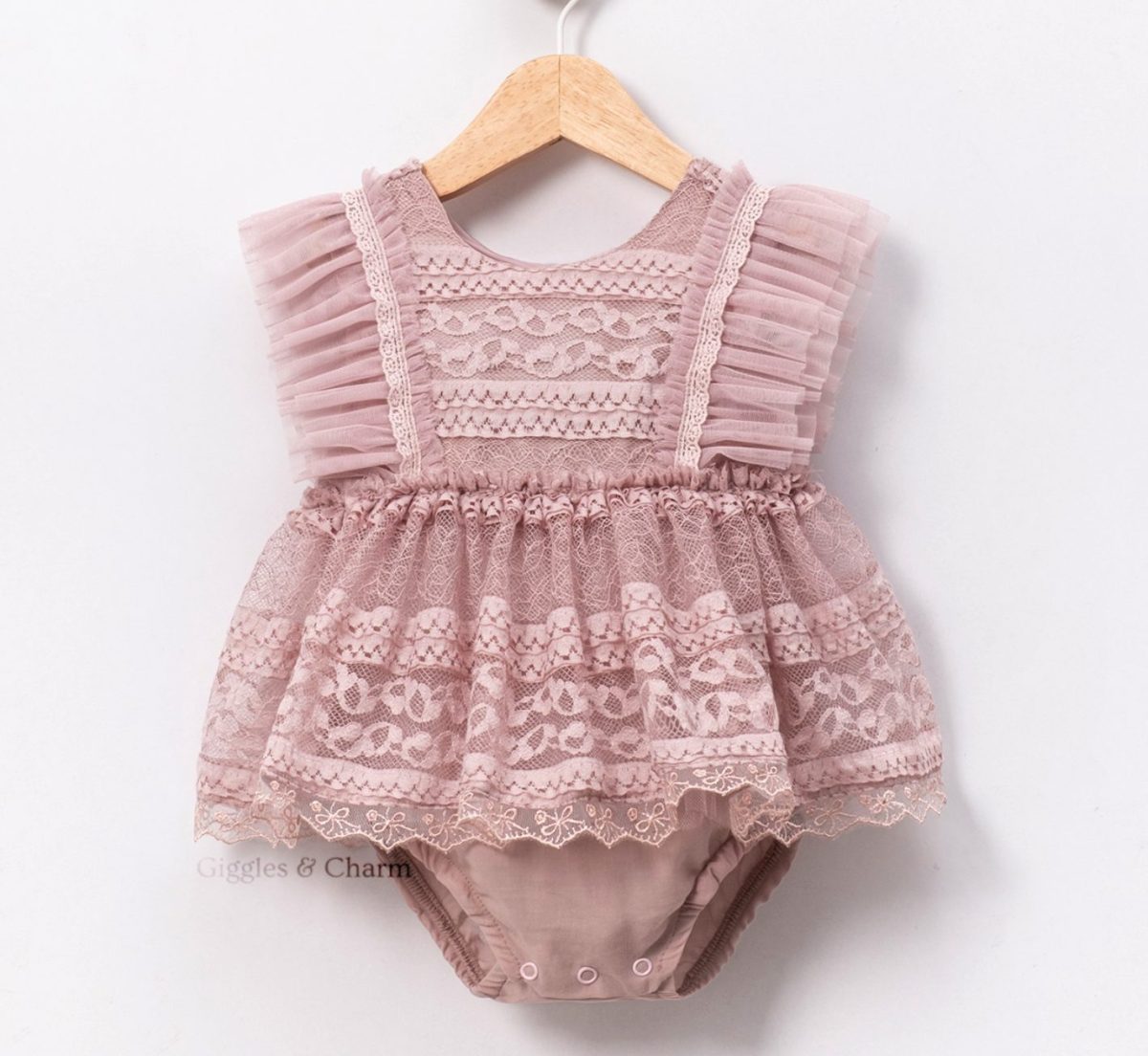 Feathered lace onesie